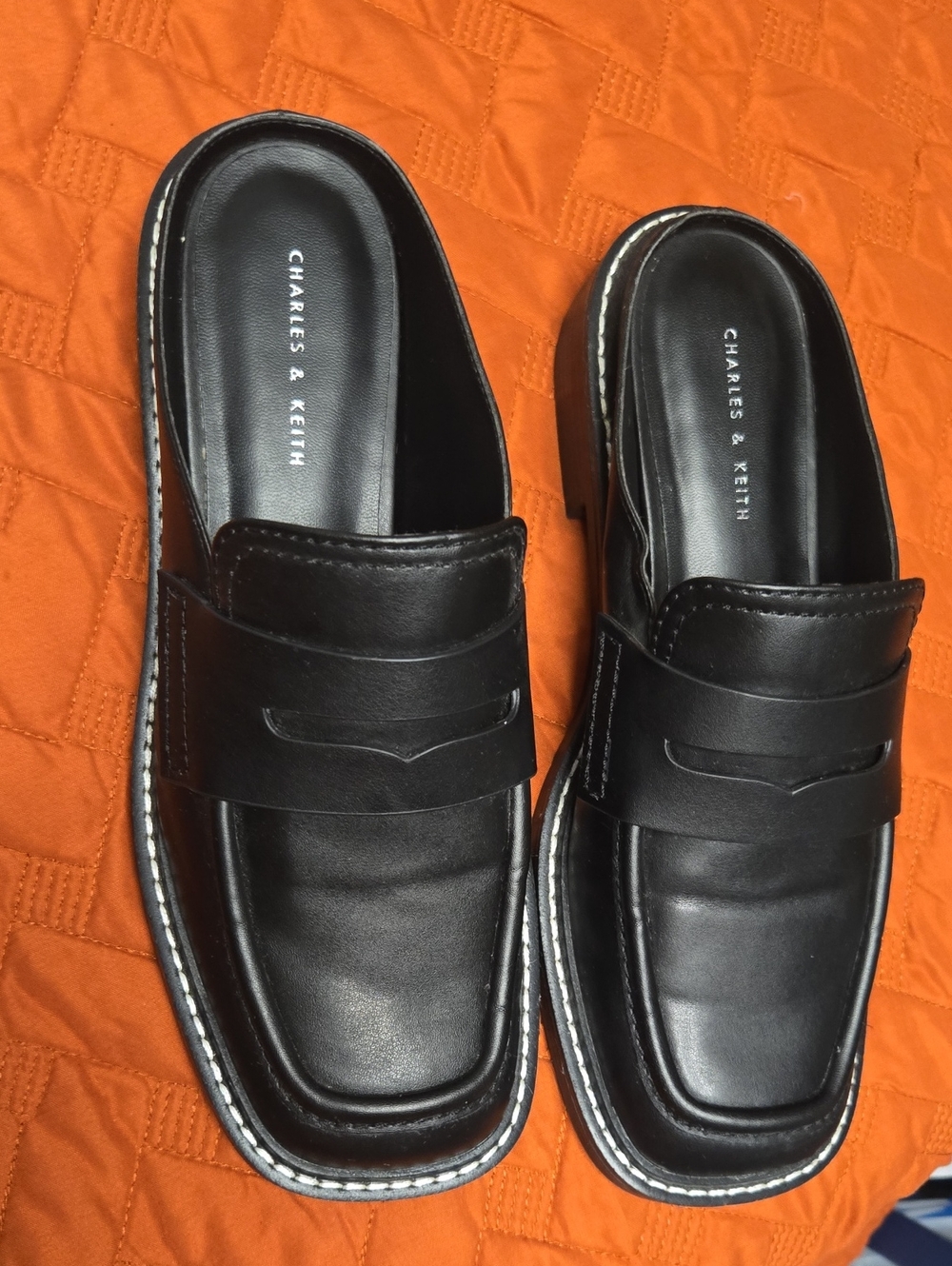 Charles & Keith Black Leather Penny Loafers with Contrast Stitching
